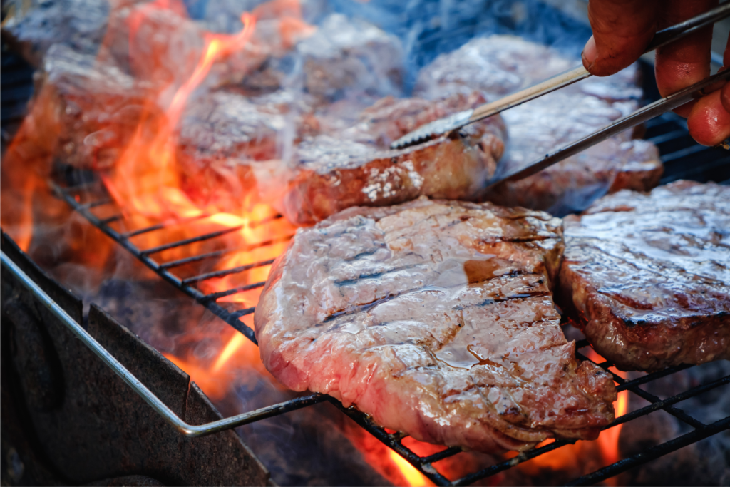 Healthy grilling with a pellet grill, showcasing meats and vegetables being cooked