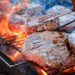 Healthy grilling with a pellet grill, showcasing meats and vegetables being cooked